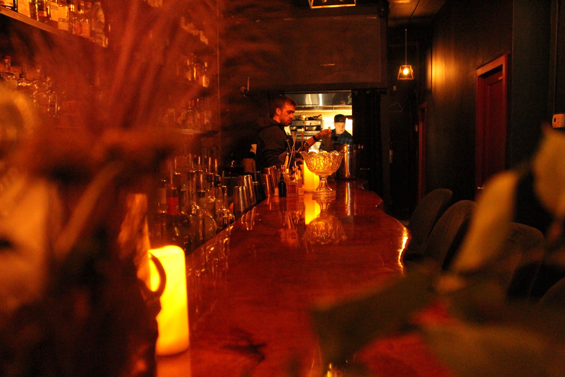 The bar at Aura by candlelight in the evening